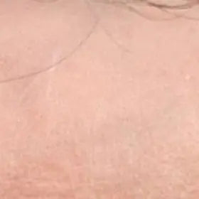 Close detail of Rainy's skin tone before starting